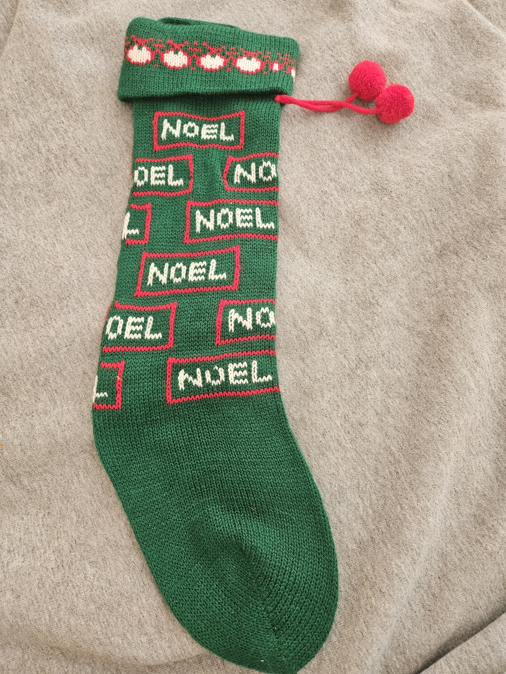 Green 'Noel' Knit Christmas Stocking with Red Pom Poms